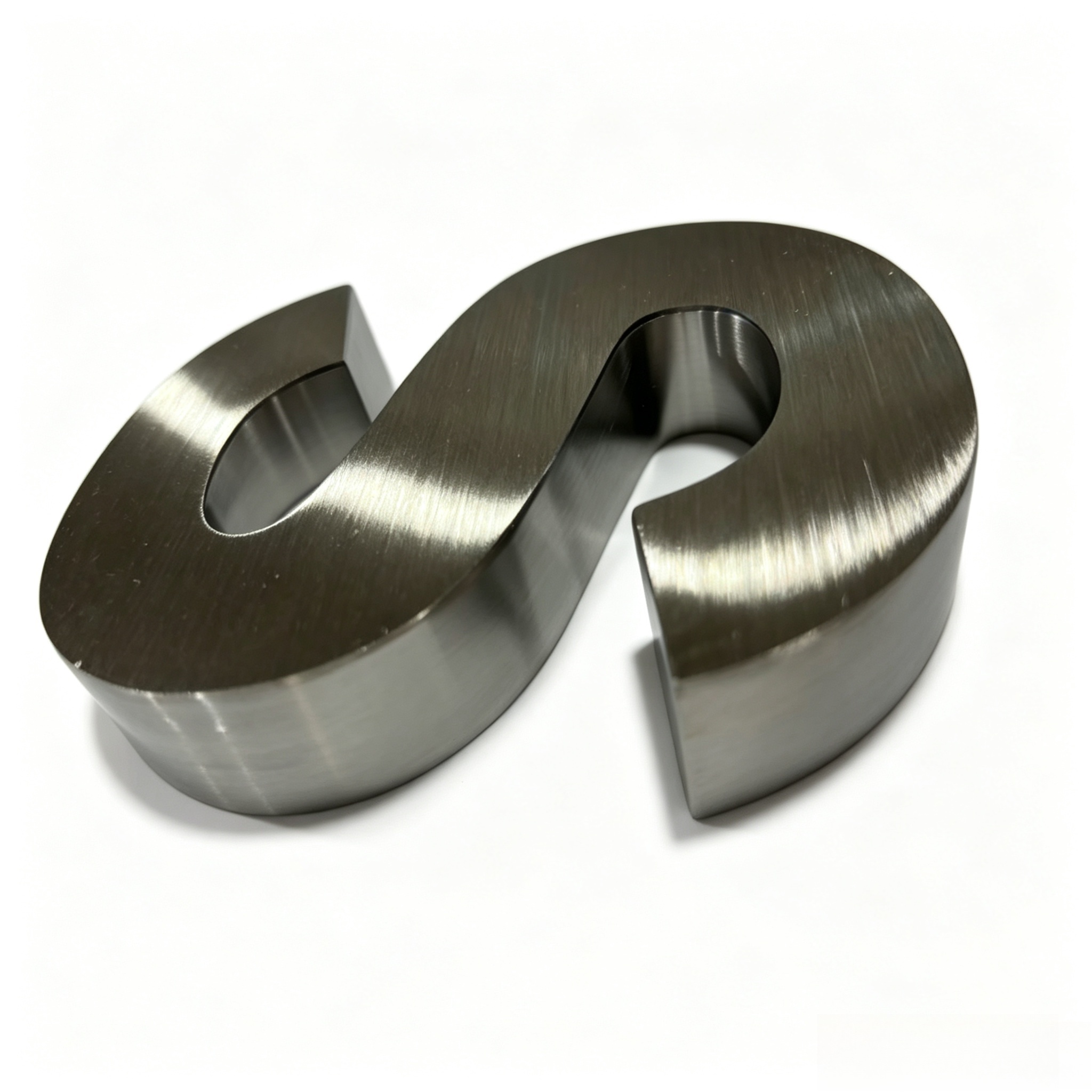 Factory close‑up shot of non‑illuminated brushed stainless‑steel 3D letter, showing thickness and surface brushing texture
