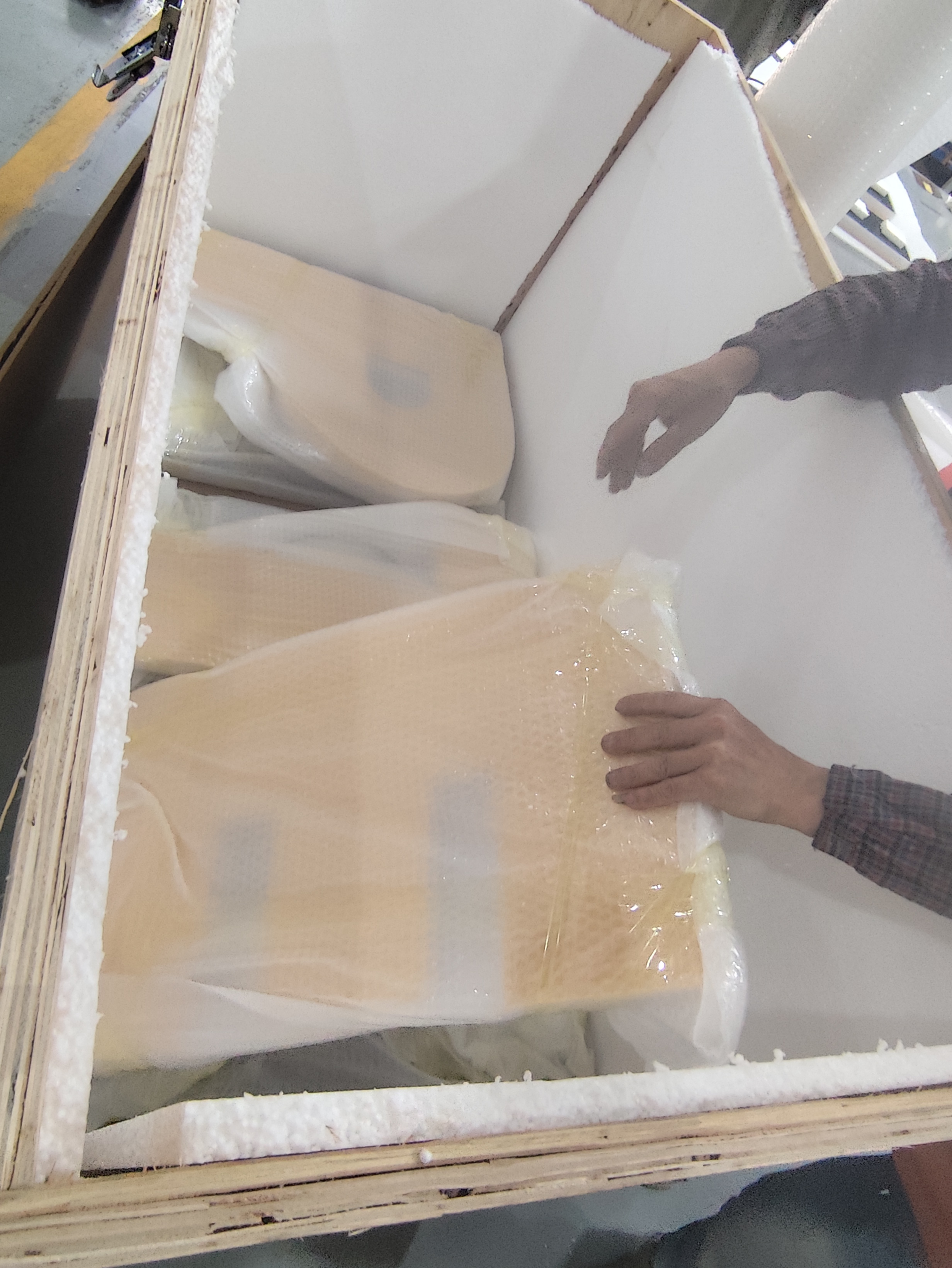 Solid wood crate + thick foam = signs arriving safe after weeks at sea.