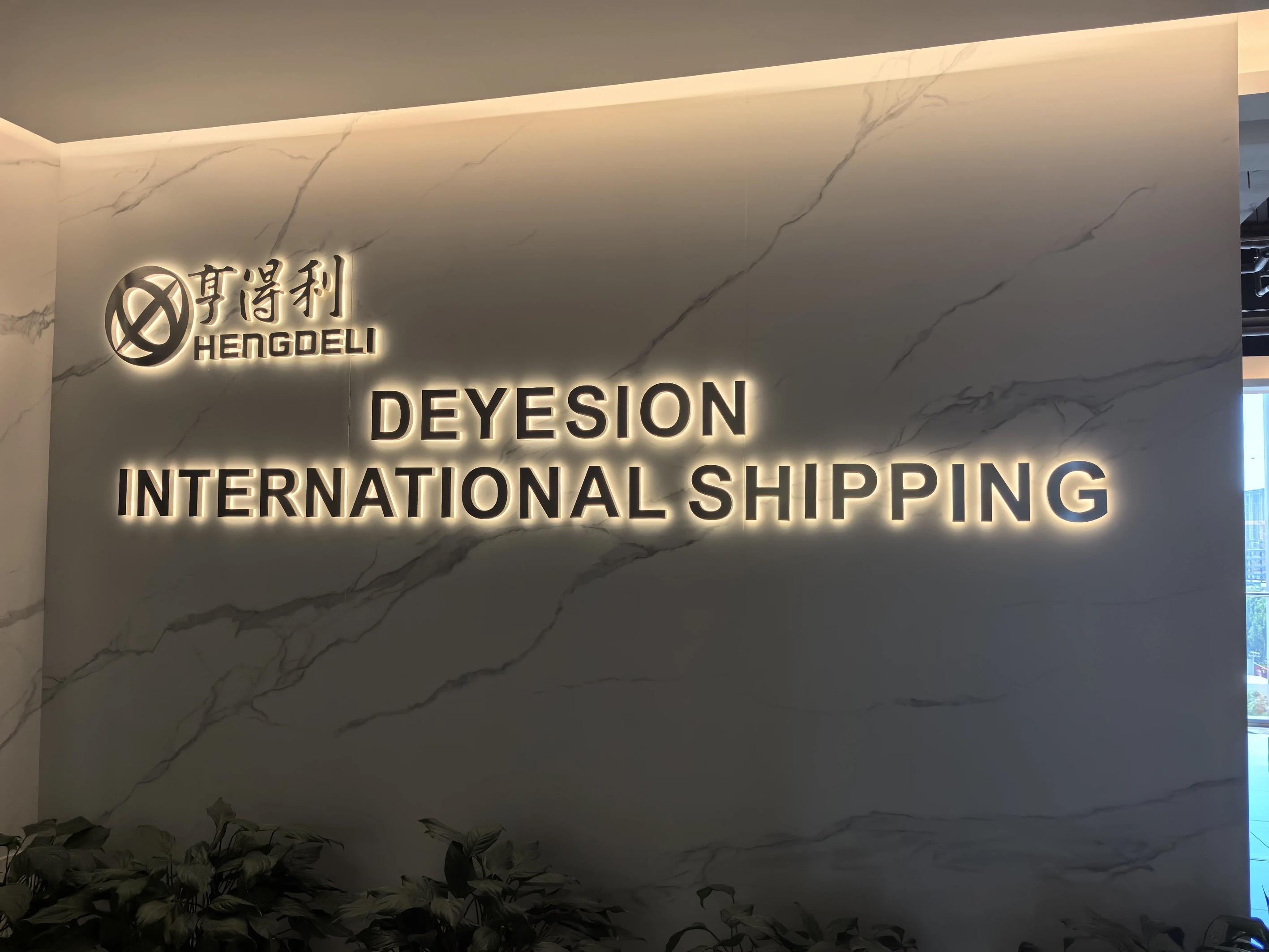Backlit Stainless Steel Letter Sign | Office Lobby Project Stainless steel backlit 3D letter sign for office lobby brand wall